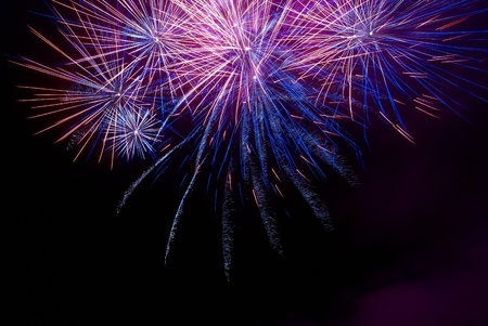 Colorful fireworks on the black sky backgroundの写真素材