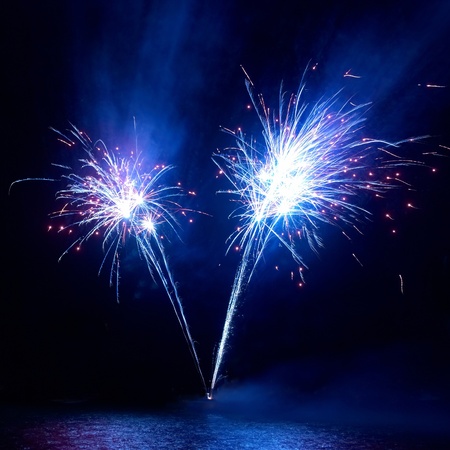 Colorful fireworks on the black sky backgroundの写真素材