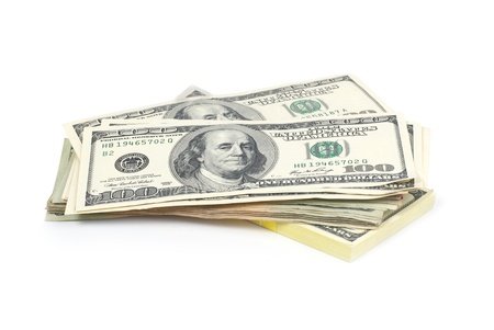 Stack of money- cash of US dollars isolated on white backgroundの写真素材