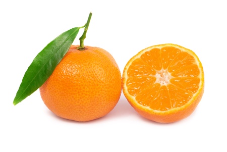 Orane mandarins with green leaf isolated on white backgroundの写真素材
