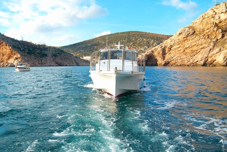 Motor boat cruising the sea near coast. Seascape の写真素材