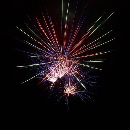 Colorful fireworks on the black sky backgroundの写真素材