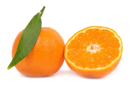 Two orange mandarins with green leaf isolated on white backgroundの写真素材