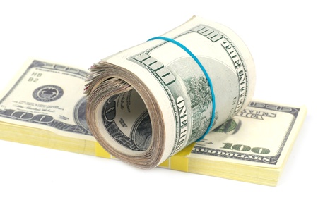Stack of money- cash of US dollars isolated on white backgroundの写真素材