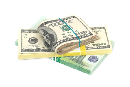 Stack of money- cash of US dollars and euros isolated on white backgroundの写真素材