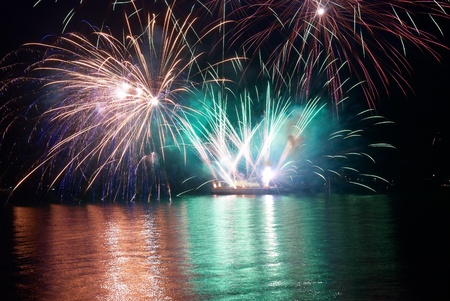 Beautiful fireworks on the black sky backgroundの写真素材