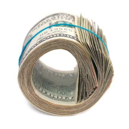 Roll of money- cash of US dollars isolated on white backgroundの写真素材