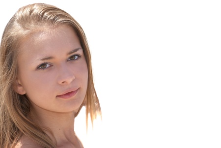 Beautiful blond girl outdoors against the white isolated background.の写真素材