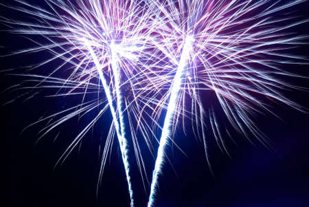 Colorful fireworks on the black sky backgroundの写真素材