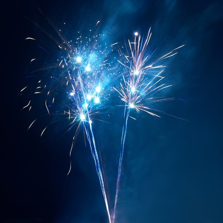 Colorful fireworks on the black sky backgroundの写真素材