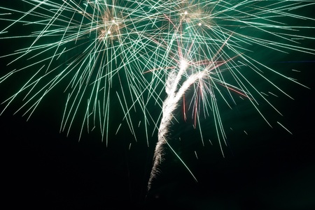 Colorful fireworks on the black sky backgroundの写真素材