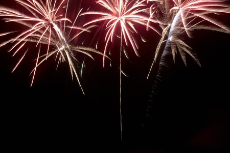 Colorful fireworks on the black sky backgroundの写真素材