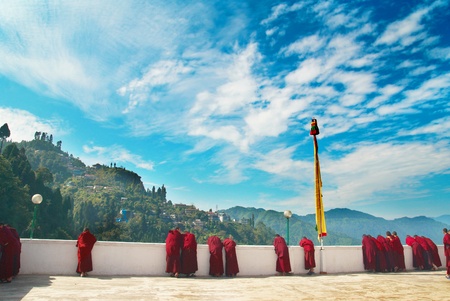 Monks in red robes in the indian monasteryの写真素材