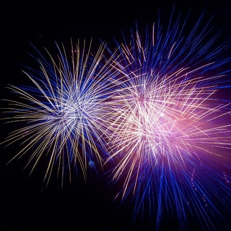 Colorful fireworks on the black sky backgroundの写真素材