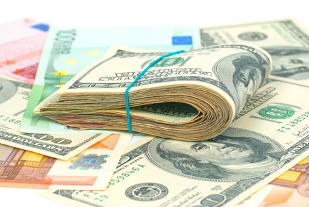 Pile of money- cash of US dollars and euros for business backgroundの写真素材