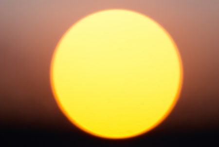 Big red star Sun. Sunset over the horizon.の写真素材