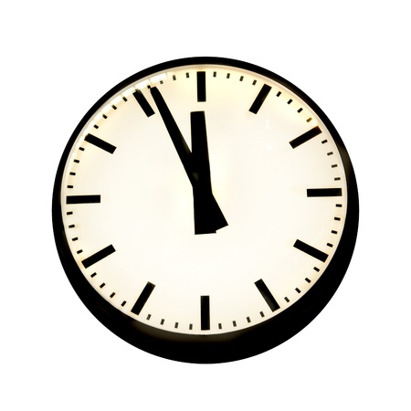 Five to twelve on the clock. Isolated on whiteの写真素材