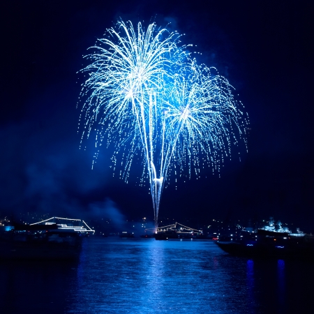 Colorful fireworks on the black sky backgroundの写真素材