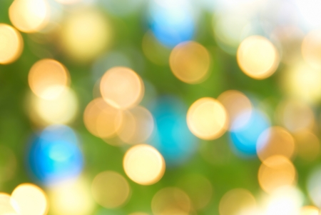 Holiday blue, yellow and green lights- christmas soft backgroundの写真素材