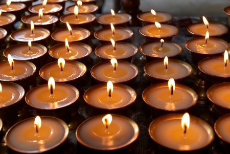 Rows of candles in the indian templeの写真素材