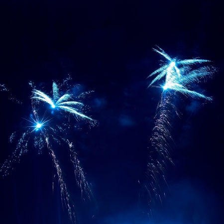 Colorful fireworks on the black sky backgroundの写真素材