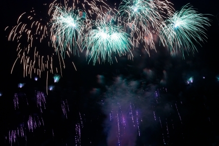 Colorful fireworks on the black sky backgroundの写真素材