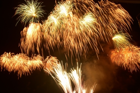 Colorful fireworks on the black sky backgroundの写真素材