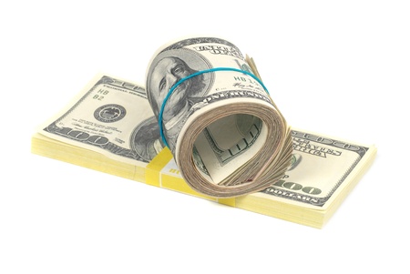 Stack of money- cash of US dollars isolated on white backgroundの写真素材