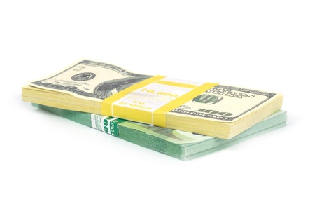 Stack of money- cash of US dollars and euros isolated on white backgroundの写真素材
