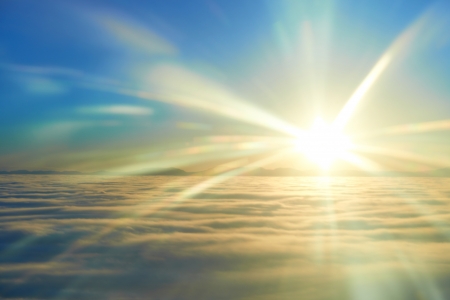 Amazing view from plane on the sky, sunset sun and clouds