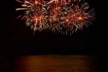 Colorful fireworks on the black sky backgroundの写真素材