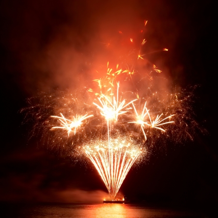 Colorful fireworks on the black sky backgroundの写真素材