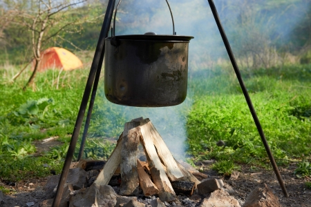 Pot boiling on fire  Fireplace in the forest の写真素材