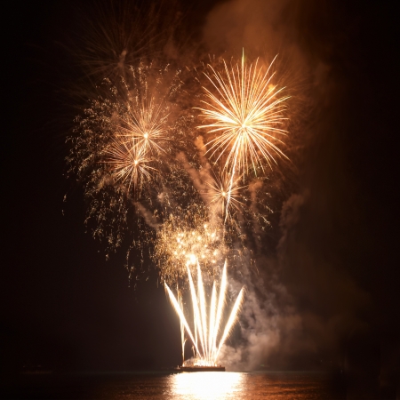 Colorful fireworks on the black sky backgroundの写真素材