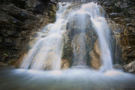 Beautiful waterfall in the forest  Water motion の写真素材