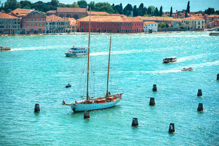 View from Campanile bell tower on yacht in Grand Canal.  Sunny day in Venice, Italy.の写真素材