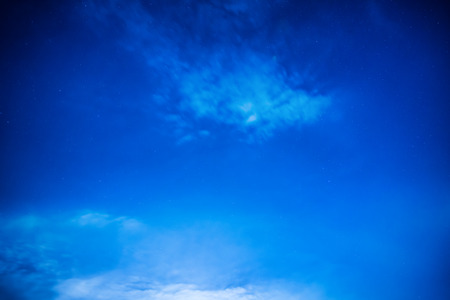 Dark blue night sky with many stars. Milky way backgroundの写真素材