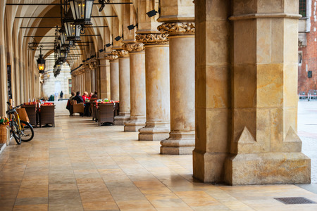 Passage of the gothic hall with columns. Main market square of Krakow city, Polandの写真素材
