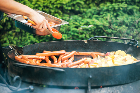 Sausages cooking on the grill. Barbecue festの写真素材