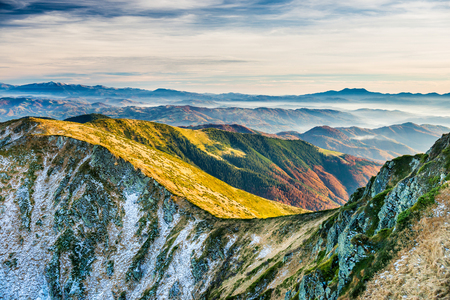Sunset in the mountains. Landscape with hills, sky and cloudsの写真素材