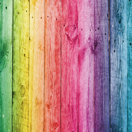 Rainbow wooden desk for background. Full natural colors of spectrum on boardの写真素材