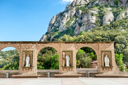 Statues on square in Montserrat monastery in Barcelona, Spainの写真素材