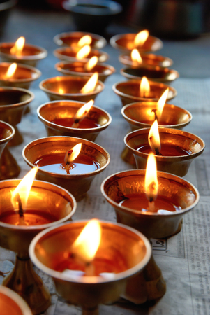 Rows of candles in the indian templeの写真素材