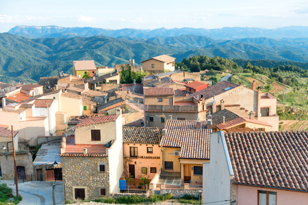 Houses with red roof tiles in a small european town, Spainの写真素材