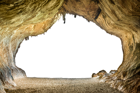 Big empty cave with entrance to white isolated backgroundの写真素材