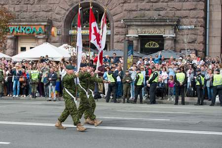 KIEV, UKRAINE - AUGUST 24, 2017: Military parade in Kyiv, dedicated to the Independence Day of Ukraine, 26th anniversary. Marching NATO military troops of ukrainian ally from Canada on Khreshchatyk streetのeditorial素材