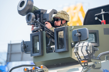 KIEV, UKRAINE - AUGUST 24, 2018: Military parade in Kiev, dedicated to the Independence Day of Ukraine, 27th anniversary. Military vehicle and solder with Javelin on Khreshchatyk streetのeditorial素材