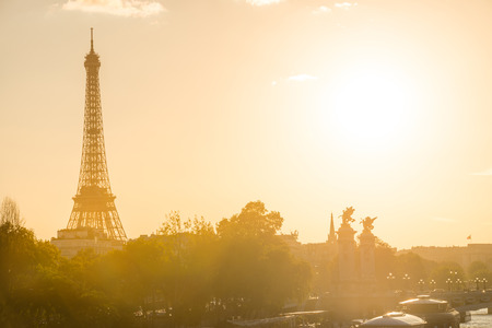 Beautiful sunset with Eiffel Tower and Seine river in Paris, France