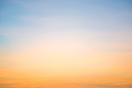 Beautiful cloudscape with blue sky and fluffy clouds at sunsetの写真素材