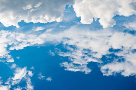 Beautiful white clouds on the blue sky as nature backgroundの写真素材